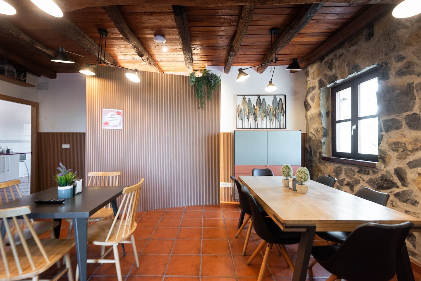 Common dining room of the rural house Artola with tables and chairs