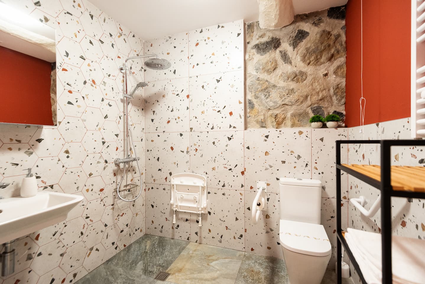 Adapted bathroom with accessible shower in the rural house Artola